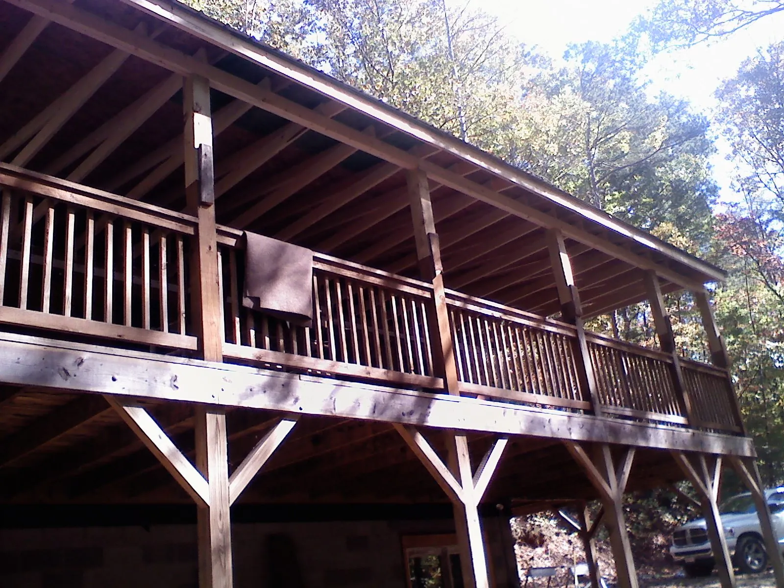 Timber framing under a new elevated porch and deck — Roof Leak Repair in Park Rapids by Roofing Brothers